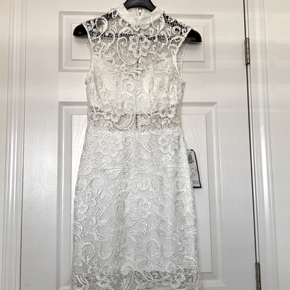 B. Darlin White Sleeveless Lace A-Line Bare Midriff Dress; Engagement dress